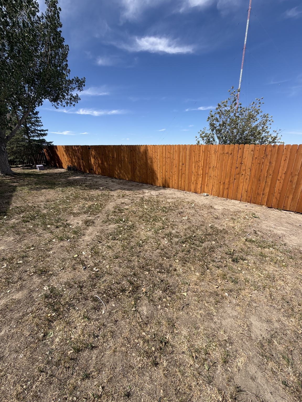Long custom wood privacy fence